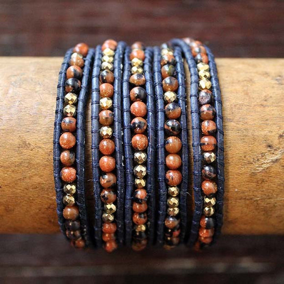 JuneStones five wrap bracelet Optimism featuring Pyrite and Goldstone gemstones and natural leather