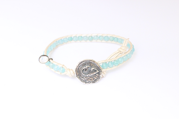 Women's wrap bracelet with Moonston and Blue Quartz gemstones on natural leather