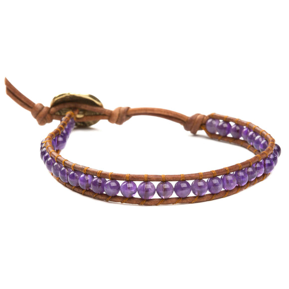 Women's wrap bracelet with amethyst gemstones on natural leather