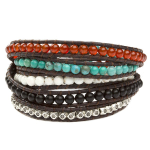 Women's five wrap bracelet with Onyx, White Buffalo Turquoise, Turquoise, and Carnelian gemstones on natural leather