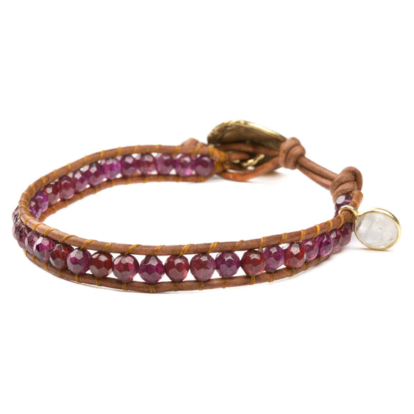 Women's wrap bracelet with garnet gemstones on natural leather