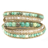 Women's five wrap bracelet with Green Moss Opal and Mother of Pearl gemstones on natural leather