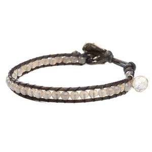 Women's wrap bracelet with labradorite and moonstone gemstones on natural leather