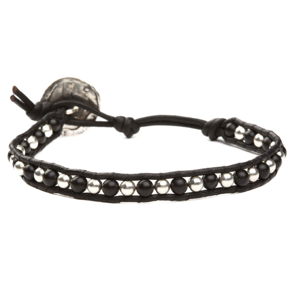 Women's wrap bracelet with onyx gemstones and sterling silver on natural leather