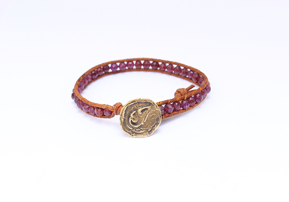 Women's wrap bracelet with Garnet gemstones on natural leather