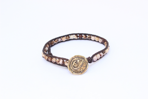 Women's wrap bracelet with Leopard Skin Jasper gemstones on natural leather