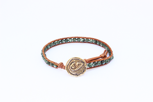 Women's wrap bracelet with Seraphinite gemstones on natural leather